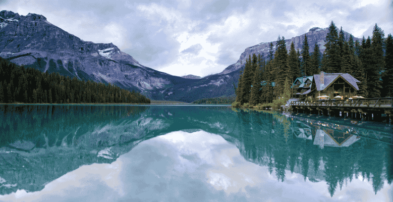 Emerald Lake Lodge reflected in calm waters at Emerald Lake, Yoho National Park, British Columbia